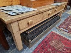 A LARGE PINE COFFEE TABLE WITH TWO DRAWERS.