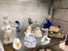 A COLLECTION OF NAO, WORCESTER AND OTHER FIGURINES