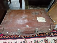 A REVELATION BROWN SUITCASE