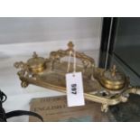 A VICTORIAN BRASS INKSTAND