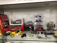 A COLLECTION OF BOXED DIE CAST TOYS, OTHER LOOSE, LEAD ANIMALS AND 3 RELATED BOOKS
