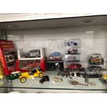 A COLLECTION OF BOXED DIE CAST TOYS, OTHER LOOSE, LEAD ANIMALS AND 3 RELATED BOOKS