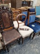 TWO PAIRS OF VICTORIAN DINING CHAIRS, A CARVED OAK CHAIR AND ONE OTHER.