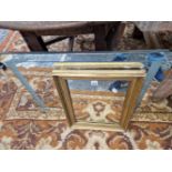 A GILT FRAMED RECTANGULAR FRAME TOGETHER WITH A MODERN MIRROR