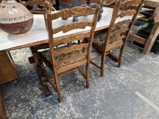 AN ERCOL ELM DINING TABLE 74 X 181 X 89CMS, AND SIX LADDER BACK CHAIRS.