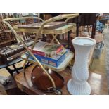 AN EDWARDIAN INLAID TRAY, A CARVED PANEL, A TEA TROLLEY A CERAMIC STAND,AND TWO JIGSAWS.