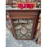 A BENTWOOD CHILDS CHAIR A GLAZED CORNER CABINET. 101 X 78 X 46CMS AND A WROUGHT IRON STANDARD LAMP.