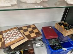 A STAUNTON STYLE WOODEN CHESS SET AND BOARD, A TRAVELLING CHESS SET AND A BEZIQUE SET