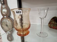 AN 18th C. OPAQUE TWIST WINE GLASS TOGETHER WITH AN AMBER CRACKLED GLASS VASE