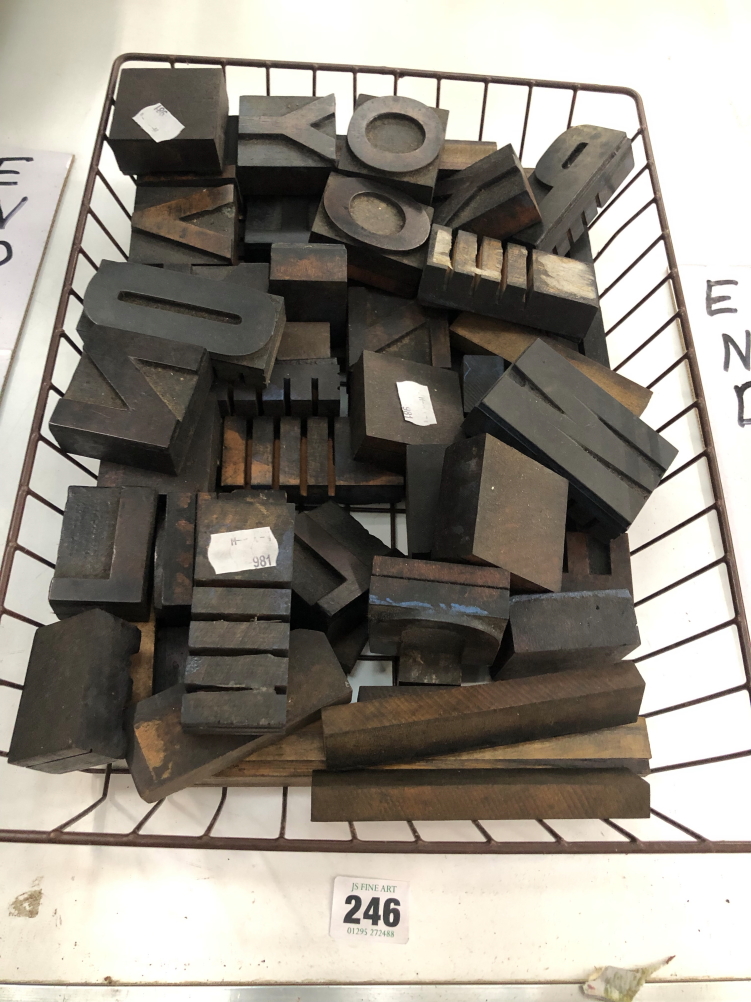 A COLLECTION OF WOODEN LETTER PRINTING BLOCKS