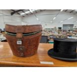 A LEATHER CASED LINCOLN BENNETT BLACK SILK PILE TOP HAT