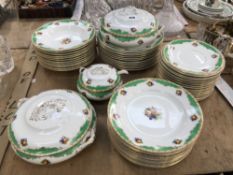 A 1920S PART DINNER SERVICE PRINTED WITH FRUIT WITHIN GREEN RIM VIGNETTES