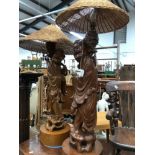 A LARGE PAIR OF ORIENTAL FIGURINES AS LAMPS