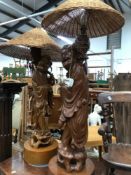 A LARGE PAIR OF ORIENTAL FIGURINES AS LAMPS