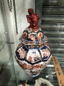 A CHINEASE IMARI PALETTE OCTAGONAL JAR AND COVER.   H 43cms.