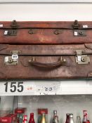 TWO LEATHER SUITCASES