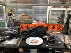 A COLLECTION OF HARLEY DAVIDSON REGALIA TO INCLUDE A PAIR OF BOOTS AND A ROAD SIGN TOGETHER WITH A