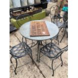 A MARBLE TOPPED GARDEN TABLE TOGETHER WITH EIGHT VARIOUS IRON GARDEN CHAIRS.