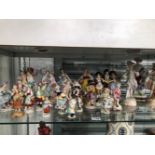 A LARGE COLLECTION OF GERMAN PORCELAIN FIGURES TO INCLUDE FIVE OF A MONKEY BAND