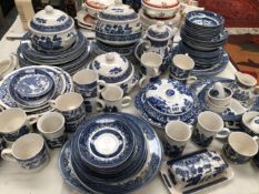 A QUANTITY OF BLUE AND WHITE DINNER WARES.