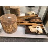 AN AFRICAN HIDE DRUM, WOODEN ARTEFACTS, DEER HOOFS, A SKULL AND A CROCODILE LEATHER LINED TRAY