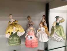 SEVEN FIGURINES OF LADIES BY DOULTON AND OTHERS