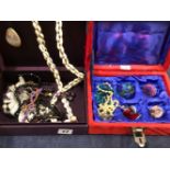 A COLLECTION OF COSTUME JEWELLERY TO INCLUDE VARIOUS BEADED NECKLACES, BROOCHES, CONTAINED IN TWO