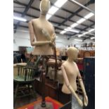 TWO ADJUSTABLE SHOP OR DRESS MAKER MANNEQUINS.