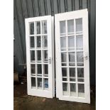 FOUR MODERN MULTI PANE GLASS DOORS.