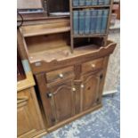 A RUSTIC PINE KITCHEN CABINET.