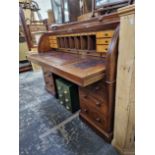 A VICTORIAN MAHOGANY CYLINDER TOP PEDESTAL DESK.