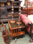 A PAIR OF OAK CANDLESTICK, A REVOLVING BOOKCASE AND A MAGAZINE RACK