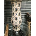 A AUSTRIAN BALUSTER VASE THE FOLIATE DIAPER CENTRED BY STEMS OF BLUE FLOWER STEMS