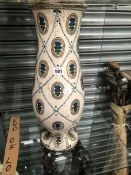 A AUSTRIAN BALUSTER VASE THE FOLIATE DIAPER CENTRED BY STEMS OF BLUE FLOWER STEMS