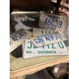 A QUANTITY OF VINTAGE KANSAS NUMBER PLATES