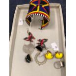 AN ETHNIC BEADED WIDE BRACELET, A SILVER AND STONE SET RING, VARIOUS EARRINGS ETC.