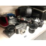 A COLLECTION OF CAMERAS, INCLUDING PRAKTICA NOVAL OLYMPUS OM10, LUXETTE SYNCHRO-CYLUX ETC