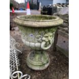 A LARGE CAST GARDEN URN WITH LION MASK HANDLES.