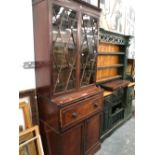 A LATE GEORIGIAN MAHOGANY SECUTARE BOOKCASE