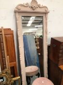 A TALL PAINTED FRAMED PIER MIRROR.