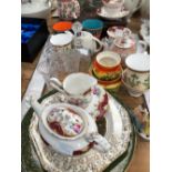 A ROYAL ALBERT PART TEA SET, COFFEE MUGS, A GLASS TABLE BELL, ETC.