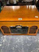 A STORTFORD OAK CASED RADIO, GRAMOPHONE AND CD PLAYER