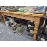 A LARGE PINE KITCHEN TABLE