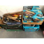FIVE BOXES OF VARIOUS TOOLS AND FIXINGS INCLUDING A BOXED TILE CUTTER AND A BATHROOM BASIN.