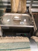 AN ELECTRIC ULTRASONIC CLEANING TANK