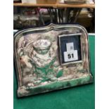 A HALLMARKED SILVER EASEL BACK PHOTO FRAME DECORATED WITH A GOLFER, RETAILED BY ASPREY LONDON.