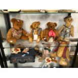 SEVEN TEDDY BEARS TOGETHER WITH THREE SOFT TOY DOGS TOGETHER WITH A TOY FISHING ROD AND A DISPATCH