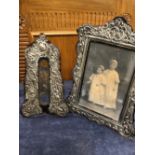 TWO SILVER AND TORTOISE SHELL EASEL BACK PHOTO FRAMES.