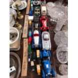 A COLLECTION OF BURAGO CARS TOGETHER WITH CORGI AND OTHER VANS AND TRUCKS