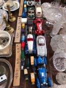 A COLLECTION OF BURAGO CARS TOGETHER WITH CORGI AND OTHER VANS AND TRUCKS